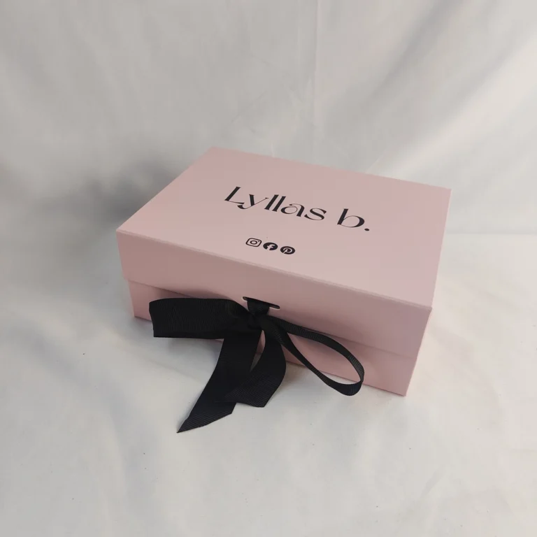 Pink folding magnetic gift box with custom logo printing for retail display.