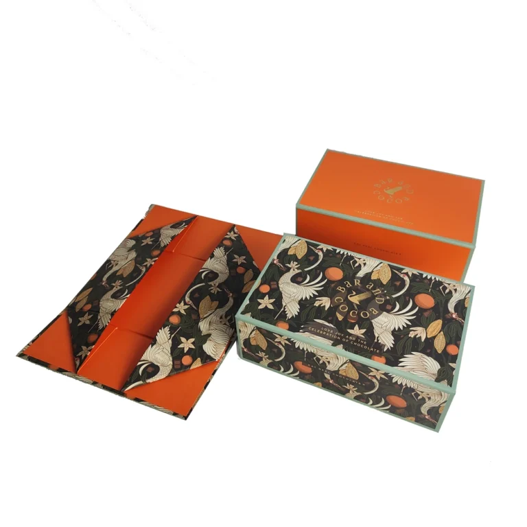 Printed luxury folding gift box featuring gold foil logo stamping and flat-pack layout.