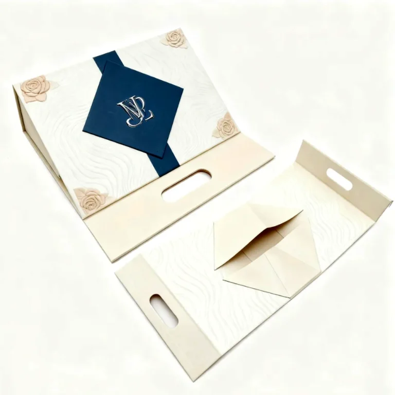 Custom triangle folding gift box in floral print with die-cut handle shown assembled and flat-packed